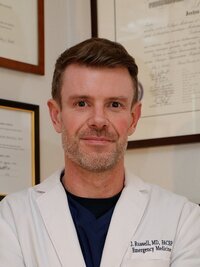 Headshot of Josh Russell, MD